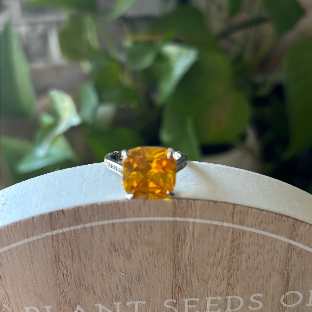 Elegant Gold Ring with Orange Gemstone